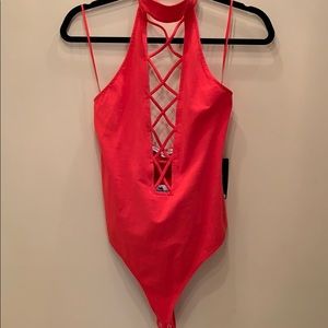Coral express bodysuit. NWT. SIZE MEDIUM